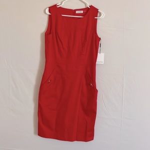 Calvin Klein - Sz 8 New with tags red dress with pockets and gold locks.